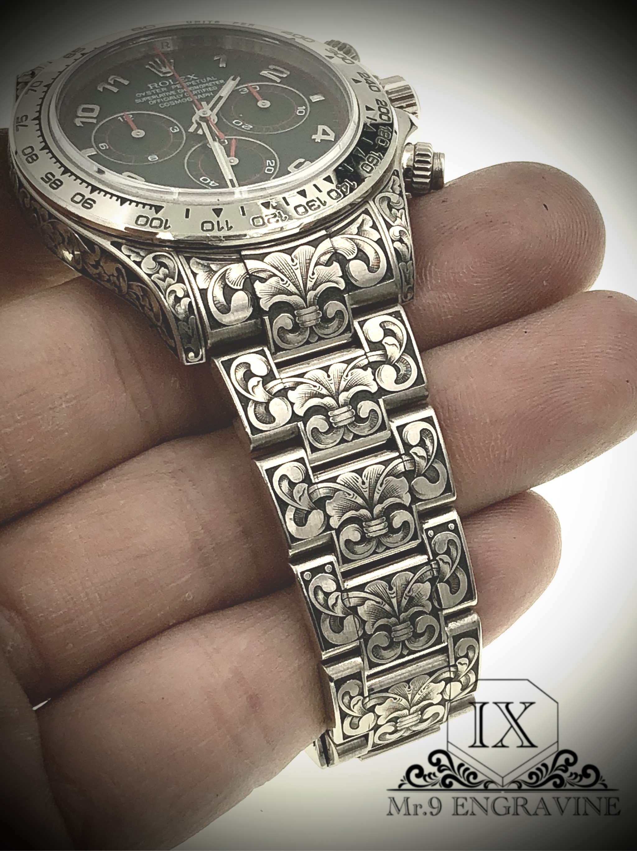 Rolex Daytona in hand