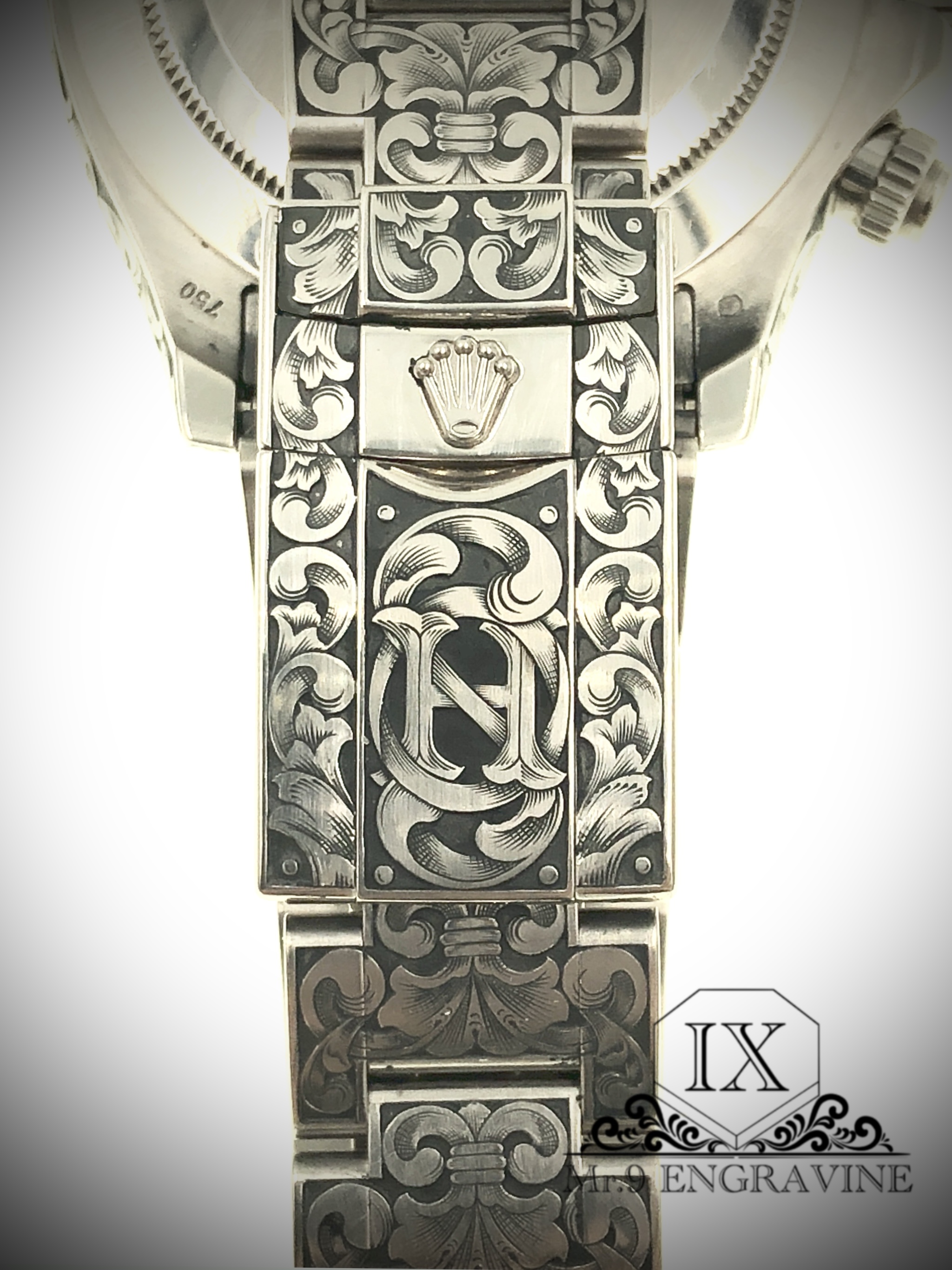 Hand-engraved Rolex Daytona with ornamental scrollwork