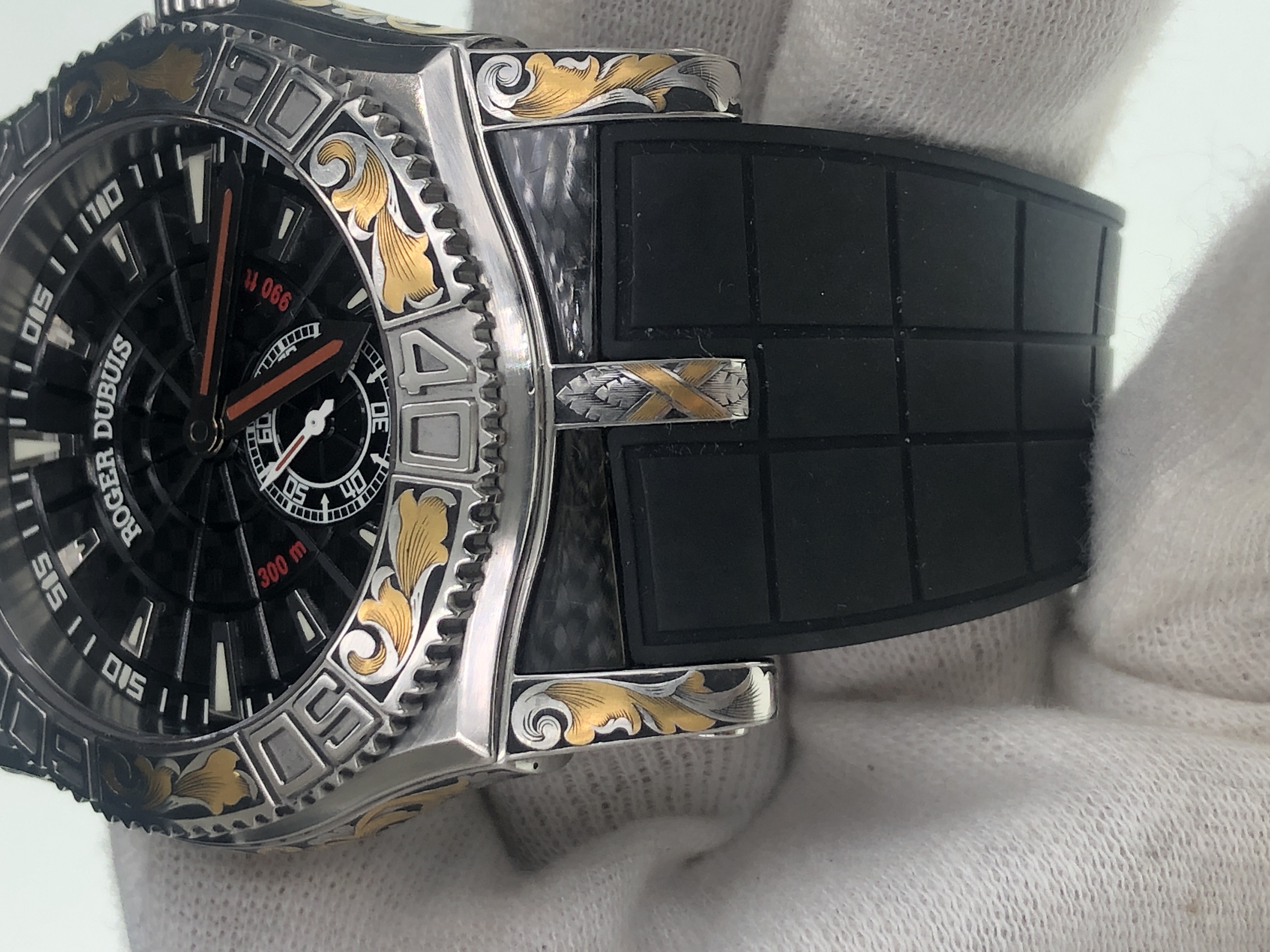 Roger Dubuis watch with detailed hand engraving
